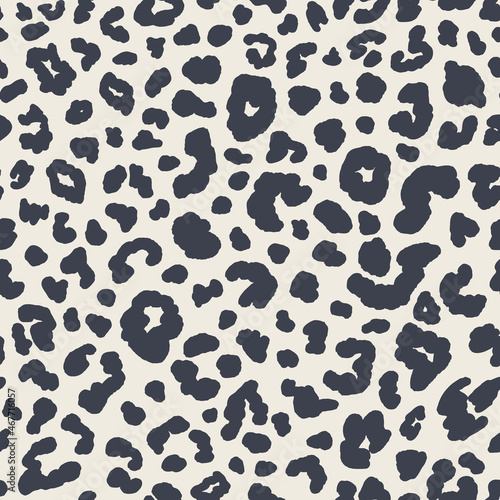 Animal skin seamless repeat pattern. Random placed, vector spot leopard print all over surface print on beige white background.