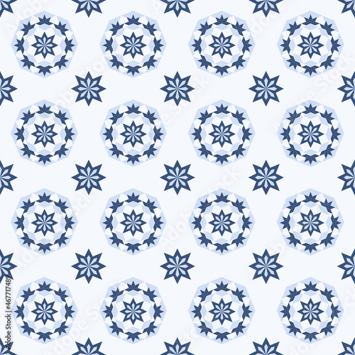 Abstract graphic seamless of blue circle flowers and leaf are repeating on light blue background.Vector beautiful pattern design for decorating, fabric,wrapping, textile, wallpaper,apparel,tile,mosaic