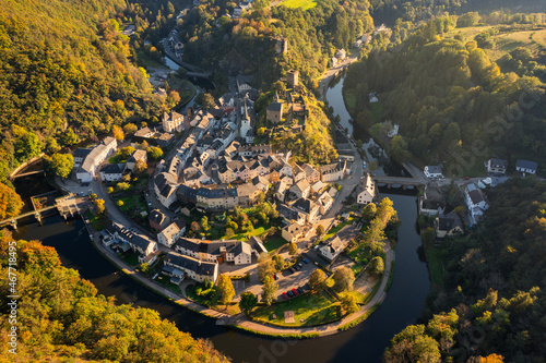 Aerial view of Esch-sur-Sure medieval town in Luxembourg famous for its ancient Castle. Forests of Upper-Sure Nature Park, meander of winding river Sauer, near Upper Sauer Lake. Canton Wiltz.