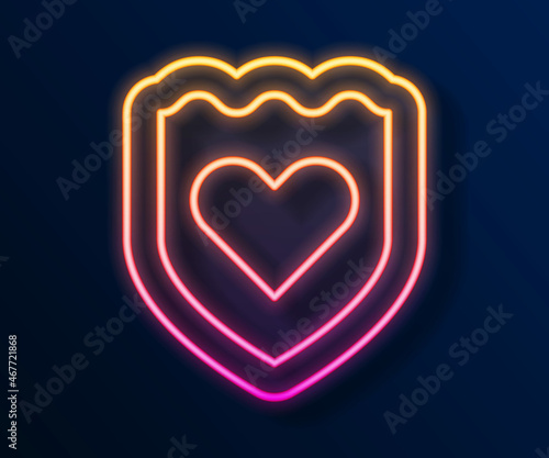Glowing neon line Immune system icon isolated on black background. Medical shield. Vector