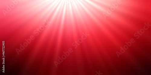 Deep red background with bright rays from top. Classical holidays template.