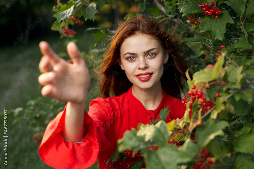 pretty woman in red shirt bush nature freedom pretty woman in red shirt bush nature freedom