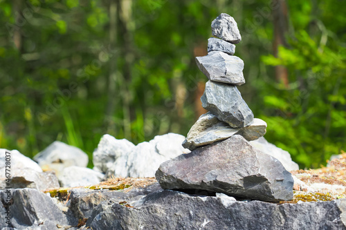 Cairn. Balanced stone pyramid on mountain, Zen stones stack