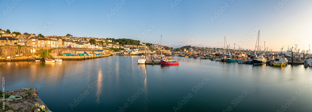 Newlyn town harbour panorama at sunrise in Cornwall. United Kingdom