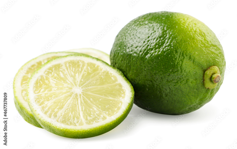 Lime whole and slices on a white background. Isolated Lime whole and slices on a white background. Isolated