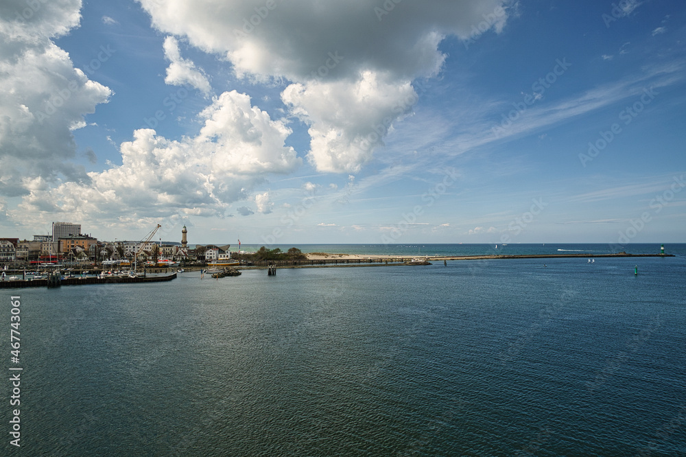 Rostock harbor exit. view over warnemünde, the beach and the lighthouse