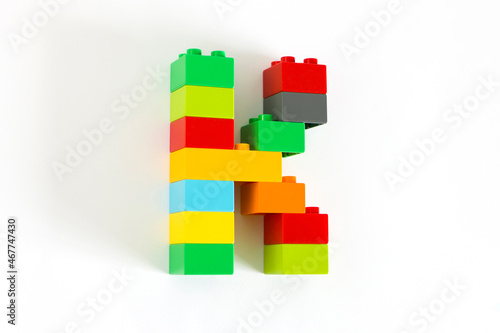 Colorful toy brick letter K