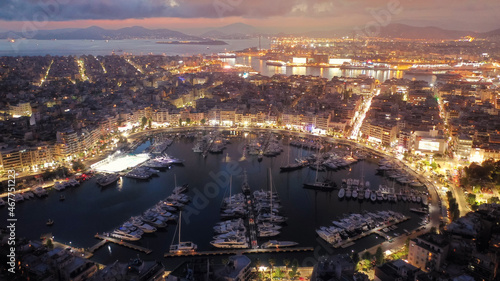 Aerial drone photo of iconic round port and Marina of Zea or Passalimani at dusk with beautiful colours, Piraeus, Attica, Greece © aerial-drone