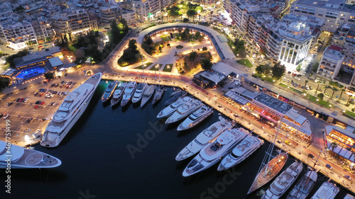 Aerial drone night shot of iconic illuminated marine museum in Marina of Zea, Piraeus, Attica, Greece