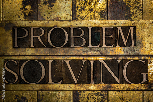 Problem Solving text message on textured grunge copper and vintage gold background photo