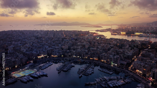 Aerial drone photo of iconic round port and Marina of Zea or Passalimani at dusk with beautiful colours  Piraeus  Attica  Greece