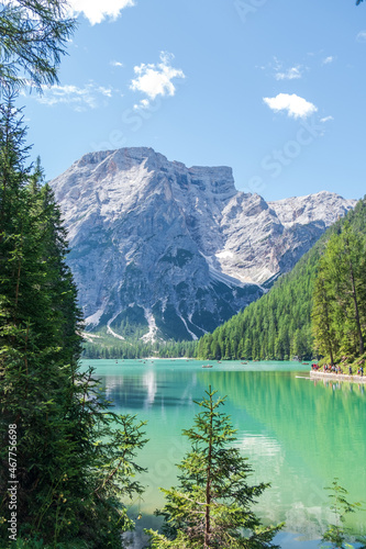 Lake Braies (also known as Pragser Wildsee or Lago di Braies) in Dolomites Mountains, Sudtirol, Italy. Romantic place with typical wooden boats on the alpine lake. Hiking travel and adventure. © Matteo