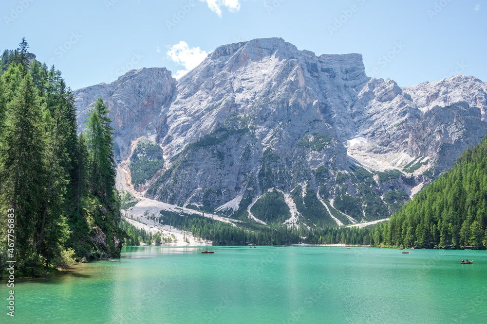 Lake Braies (also known as Pragser Wildsee or Lago di Braies) in Dolomites Mountains, Sudtirol, Italy. Romantic place with typical wooden boats on the alpine lake. Hiking travel and adventure. Lake Braies (also known as Pragser Wildsee or Lago di Braies) in Dolomites Mountains, Sudtirol, Italy. Romantic place with typical wooden boats on the alpine lake. Hiking travel and adventure.