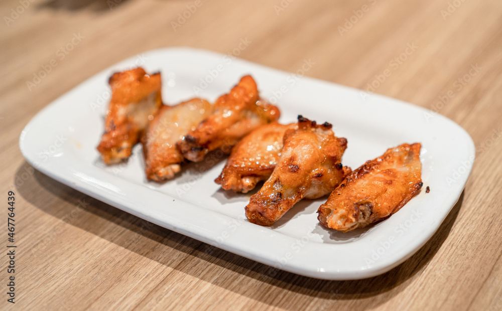 Hot and Spicy chicken wings on plate Hot and Spicy chicken wings on plate