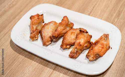 Hot and Spicy chicken wings on plate © Karina