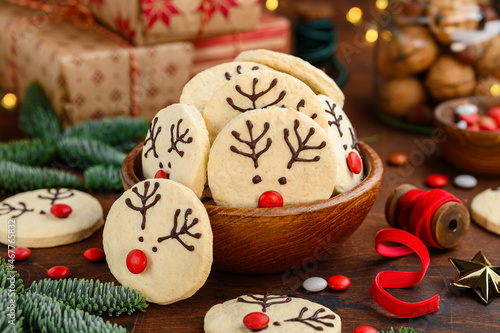 Christmas shortbread cookies deer rudolph. Festive New Year's dessert. Selective focus. 