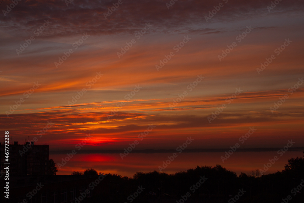 red-orange sunrise over the lake red-orange sunrise over the lake
