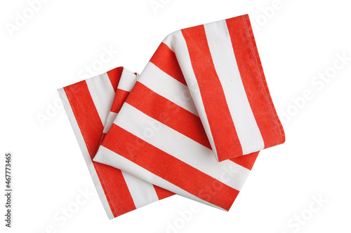 Folded red and white dishcloth isolated top view. Fodd design decorative napkin. Kitchen cloth. photo