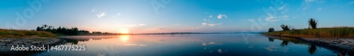 beautiful sunrise on the autumn lake © mikhailgrytsiv