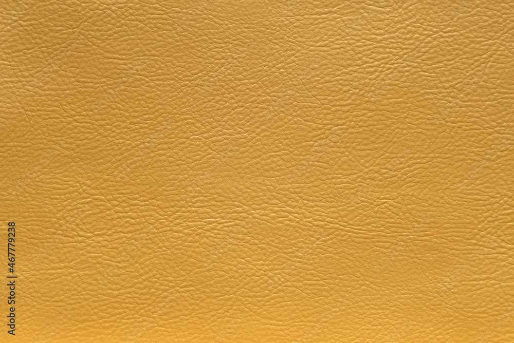 Leather texture in golden metallic color, background. Leather texture in golden metallic color, background.