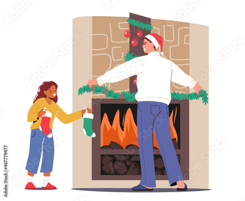 Happy Family Decorating Room on Christmas Holidays. Father and Daughter Decorate Fire Place with Fir Tree Branches