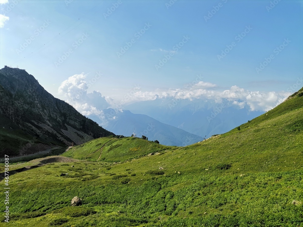Naklejka premium landscape with mountains and clouds