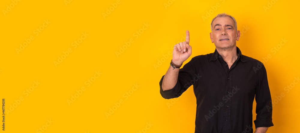 middle aged senior man isolated on background pointing middle aged senior man isolated on background pointing