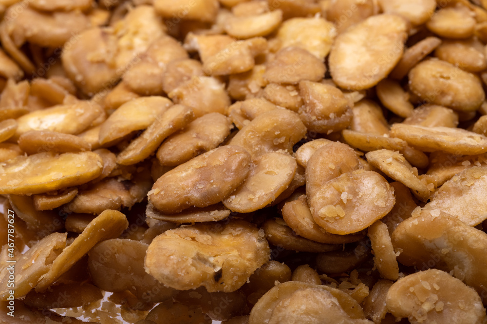 Roasted and salted fava beans for a healthy vegan and vegetarian diet snack. High in protein, vitamins, dietary fibre and nutrients Roasted and salted fava beans for a healthy vegan and vegetarian diet snack. High in protein, vitamins, dietary fibre and nutrients