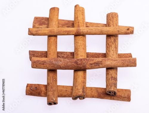 Cinnamon sticks, classic spice from the inner bark of tropical Asian trees, flavorful and aromatic for cooking, baking, health food and medicinal uses. photo