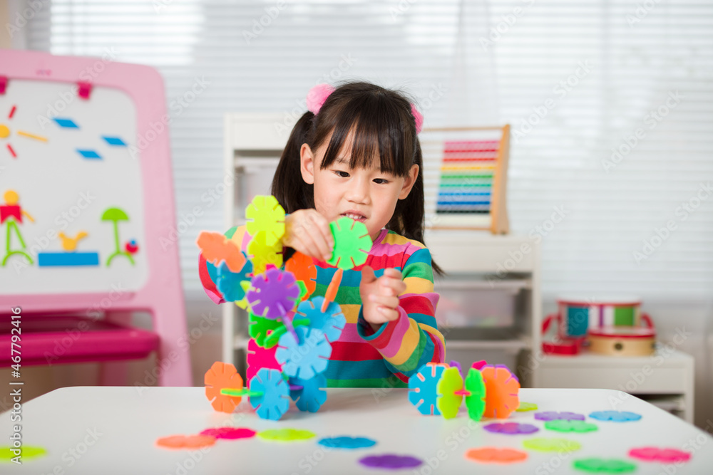 young irl playing creative toy blocks at home young irl playing creative toy blocks at home