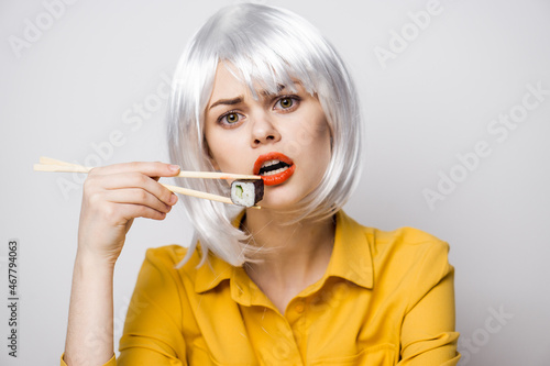 Glamorous Woman in White Wig Sushi Chopsticks