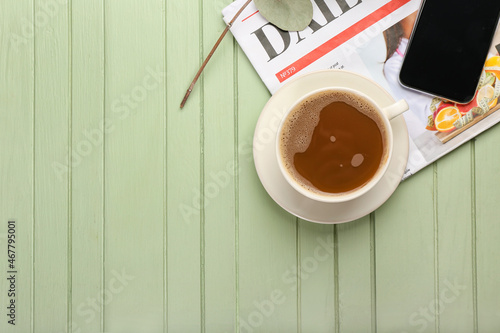 Cup of coffee and newspaper...