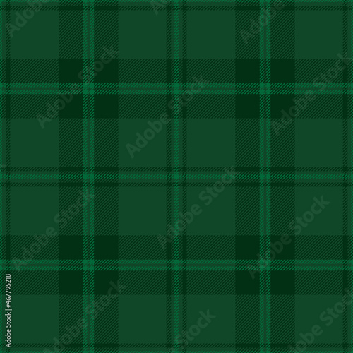 Green tartan plaid. Scottish pattern fabric swatch close-up. 