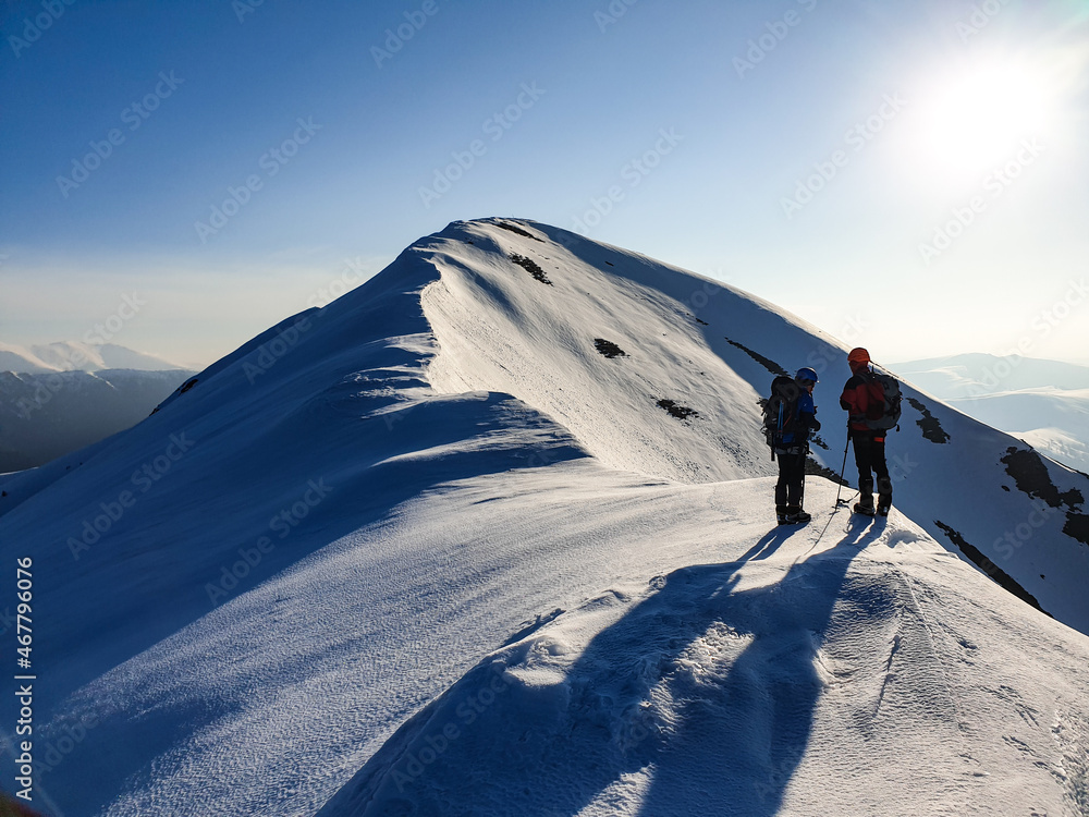 Climbers in the mountains, Oslea Ridge, Valcan Mountains, Romania 