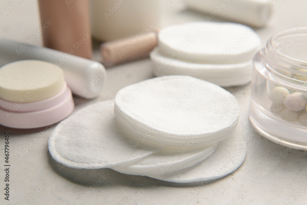 Closeup view of clean cotton pads on light table Closeup view of clean cotton pads on light table