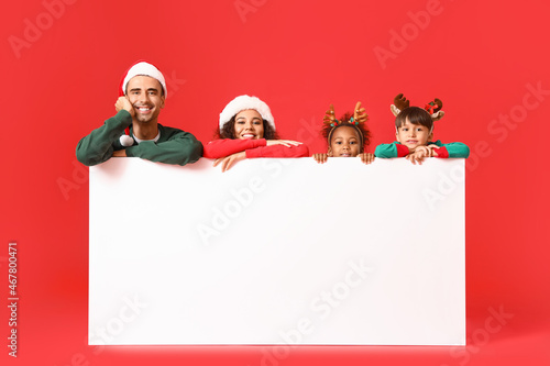 Happy family in Christmas c...