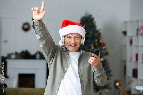 Mature man listening to Chr...