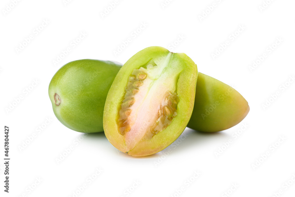 Cut fresh green tomatoes on white background Cut fresh green tomatoes on white background