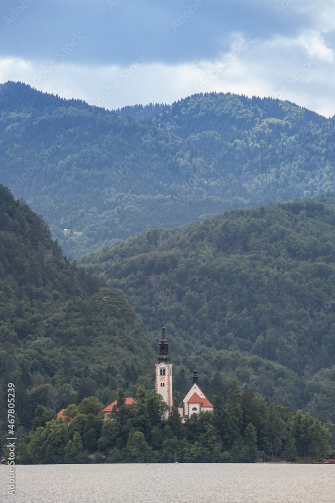  Panorama of the Blejsko ostrvo, or bled island, on Bled lake or Blejsko Jezero, with the assumption of Maria church, or cerkev marijinega vnebovzetja. it's a catholic church and monument of Slovenia