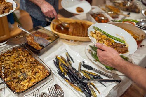 Thanksgiving potluck with family photo