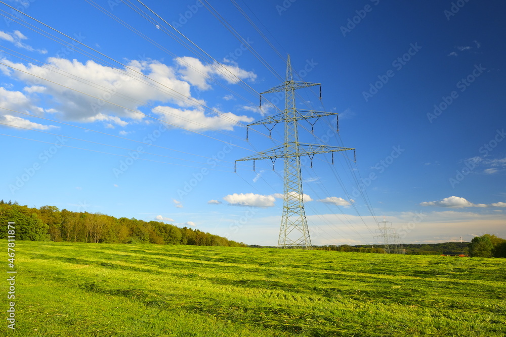 Pylon of the electricity power line on blue sky background.Electricity concept.electricity line. Power lines on blue sky background. High tension power 