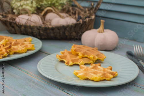 Viennese pumpkin waffles on an old wooden table. photo