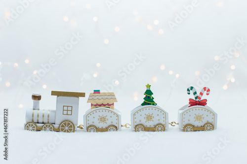 Wooden white christmas train on the white background