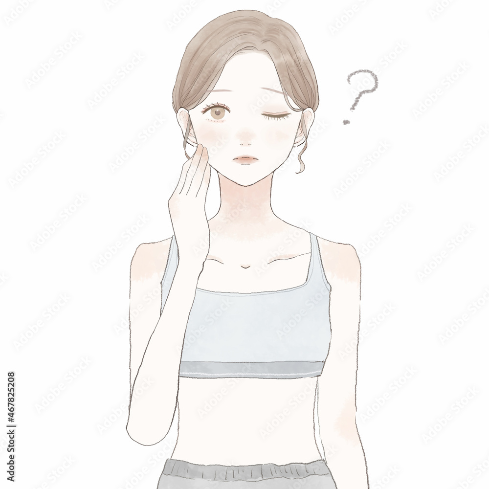 疑問を持っているスポーツウェアを着た女性