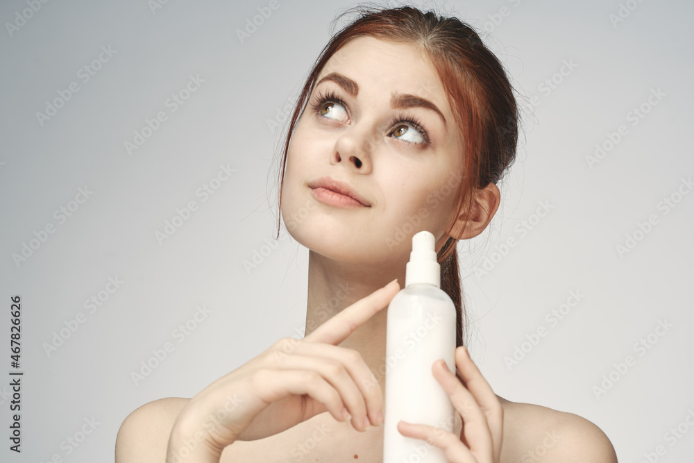 woman with bare shoulders cosmetics procedures skin care cream woman with bare shoulders cosmetics procedures skin care cream