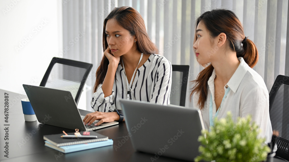Two of asian female managers in the meeting Two of asian female managers in the meeting