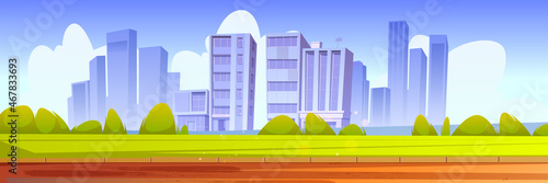 Cityscape with green lawn, bushes, walkway and urban buildings on skyline. Vector cartoon illustration of summer landscape with road, field and town on horizon