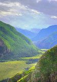 Altai mountains under a cloudy blue sky