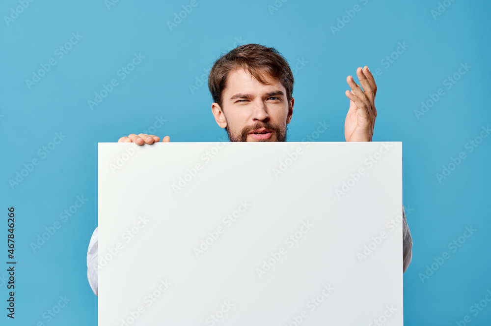 emotional man White billboard advertising copy-space isolated background emotional man White billboard advertising copy-space isolated background
