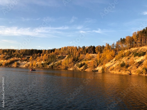 view of the autumn forest on the mountains near the lake, Russia